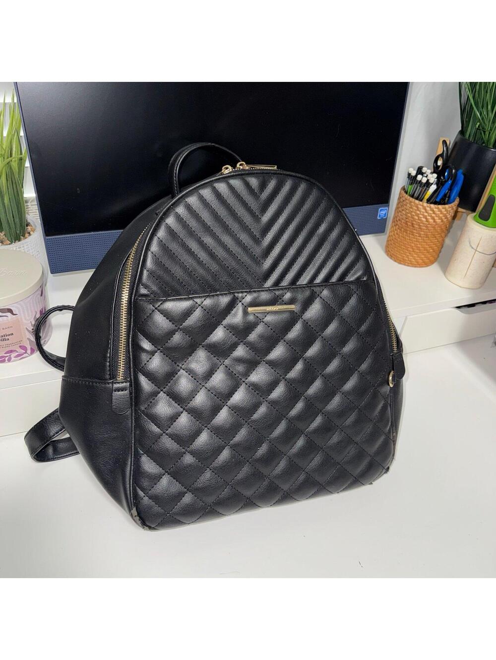 black Aldo quilted faux leather backpack with gold hardware
